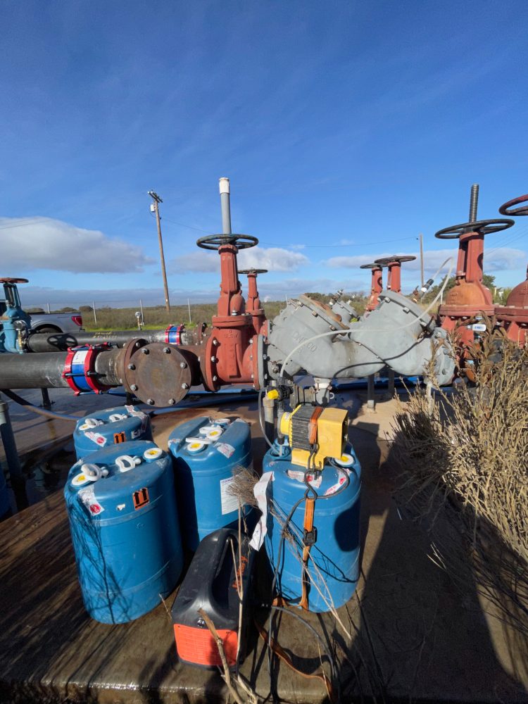 Technician repairing a water service line shutoff valve